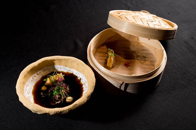 Audio visual multi-sensory chefs journey dinner experience - China provides a warm reset with duck consommé