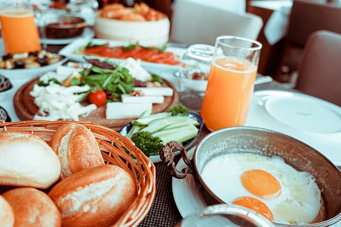 Bottomless Brunch and Cruise with Prosecco in Budapest - The buffet: eggs, pastries, cheese, and cold cuts