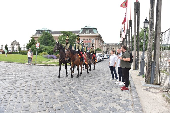 Buda Castle Walking Tour with Matthias church entry, Cake&Coffee - Walking through the Castle District