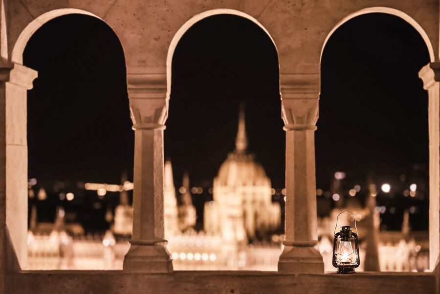 Budapest: Buda Castle District Vampires and Myths Night Tour - Fisherman’s Bastion and Budapest glowing below