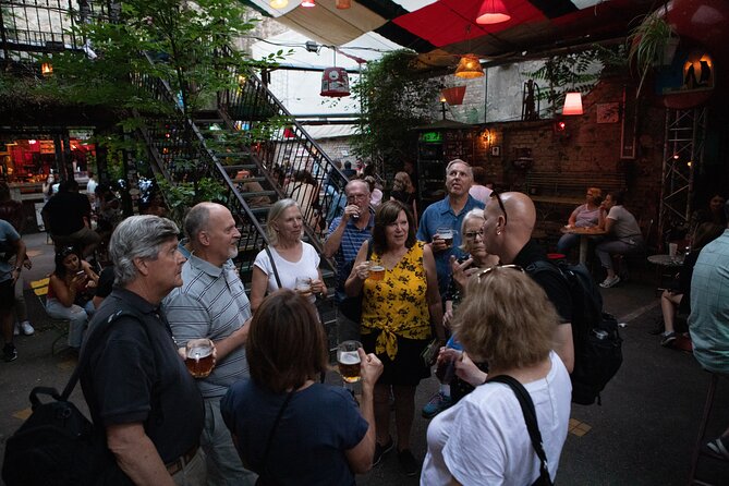 Budapest Ruin Bars Evening Walking Tour with Drinks & Street Food - The history woven into District 7