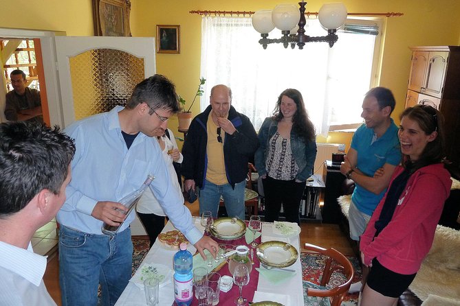 Hungarian lunch/dinner with locals in their home w/ car transfer - Conversation, translation, and the human side